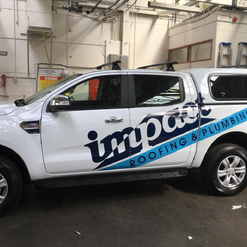 Impact Roofing and Plumbing car wrap by ProSigns